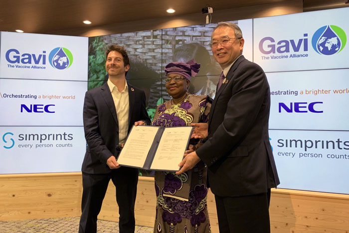 Toby Norman, Simprints CEO, Dr Ngozi Okonjo-Iweala, Gavi Board Chair, and Nobuhiro Endo, NEC Chairman of the Board. Credit: Gavi/2019/J Fulker.