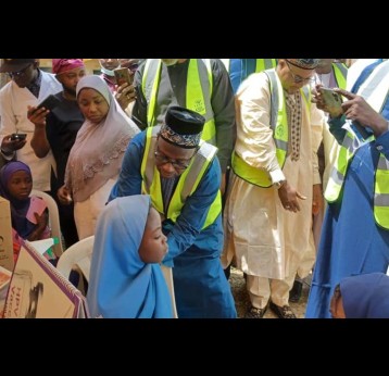  Bauchi governor administers the vaccine to a girl Credit: AsheNews