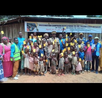 Children in Djoum district, southern Cameroon, hold up their vaccination cards after receiving the yellow fever vaccine. Credit : Zok Medjo Garrick Lionel