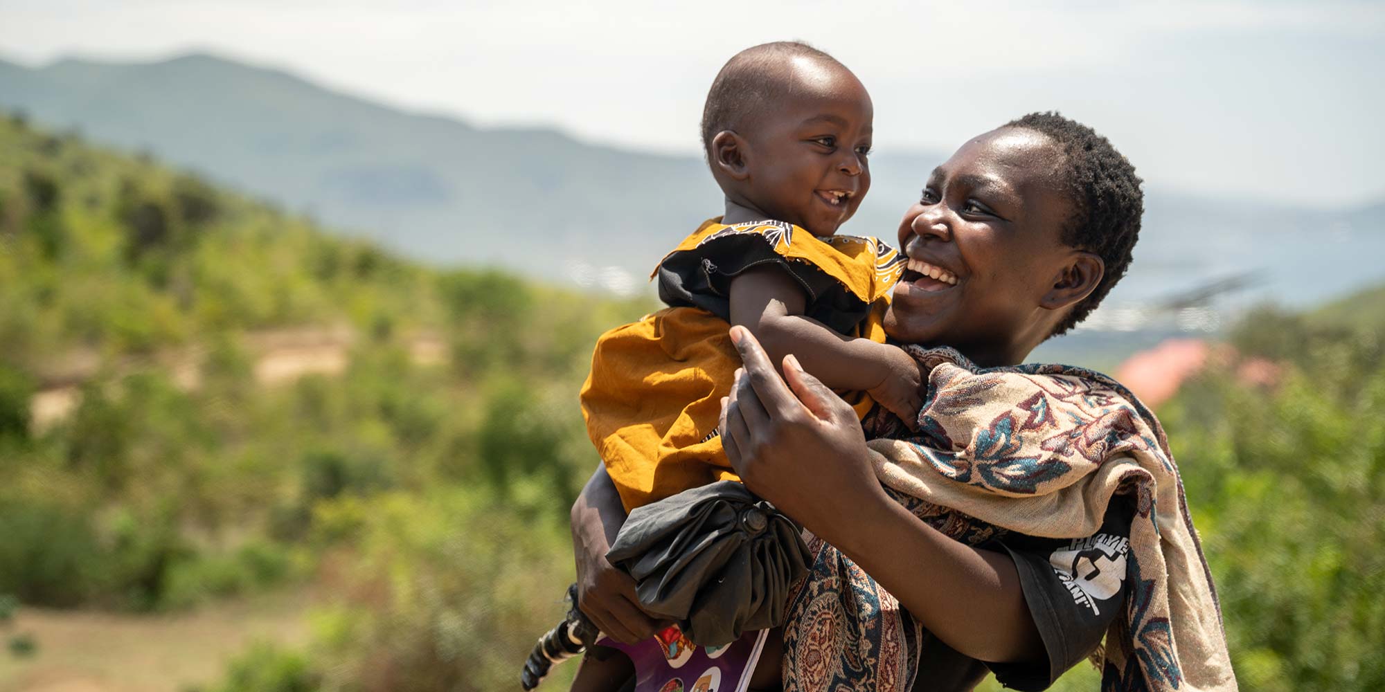 Benta Achieng, 24, with her 9 month-old son Raymond Biha. Credit: Gavi/2023/Kelvin Juma