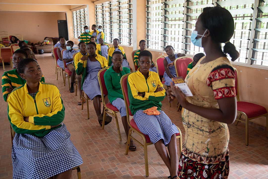 A health worker interacts with students on the COVID-19 vaccine in Adukrom in the Eastern Region, Ghana, on April 27, 2022. Ghana pushes towards community vaccination to increase its vaccinated population. Gavi/2022/Nipah Dennis