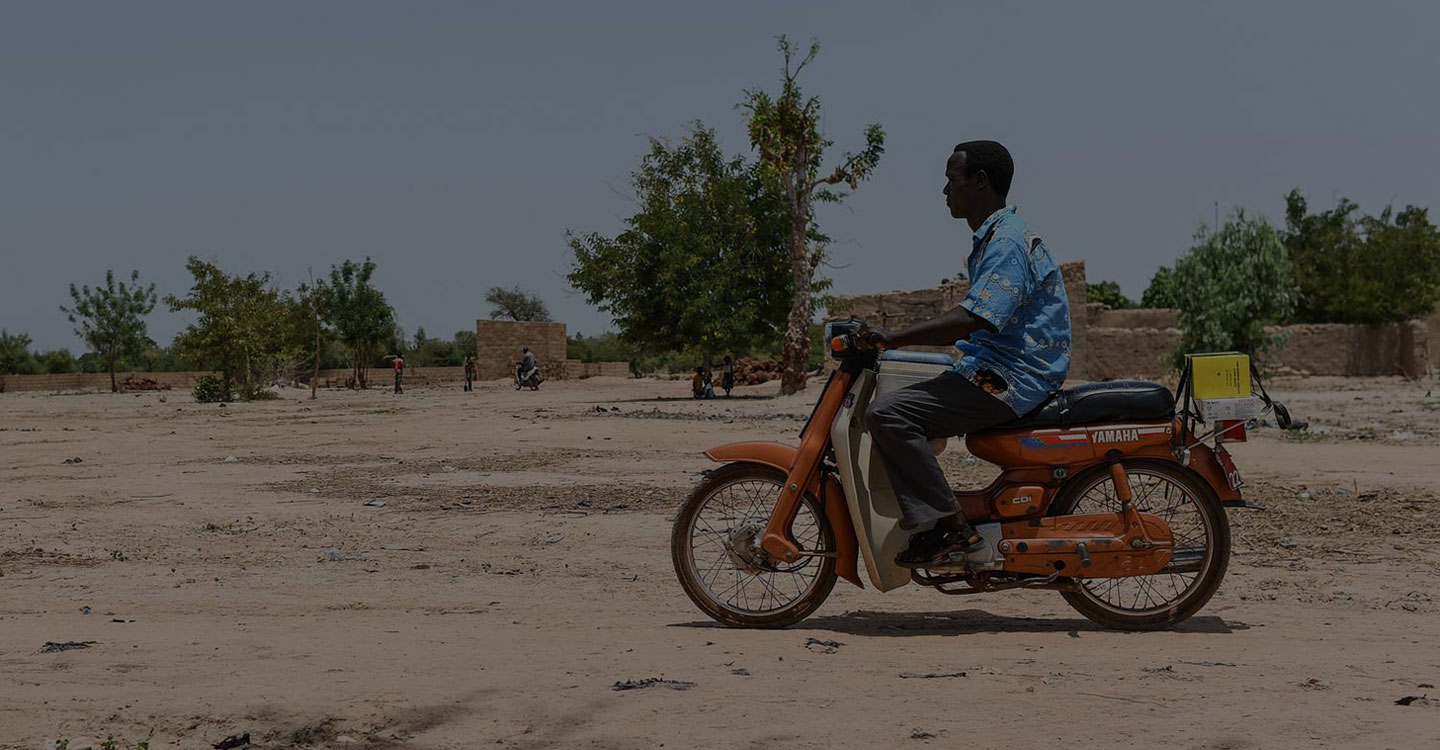 man driving a motorcycle 