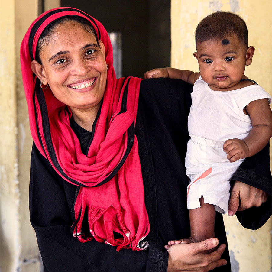 Gavi/GMB Akash - Selina comes with her grandson (Saif, 3 months ) to get him vaccinated at the Dhaka EPI center, Bangladesh