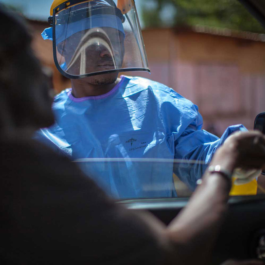 Routine checks in Guinea during period of Ebola virus. Photo: WHO/2015/Sean Hawkey