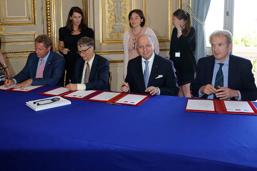 From left to right, Dr Seth Berkley, CEO of Gavi; Bill Gates Co-Chair of the Bill &amp; Melinda Gates, Laurent Fabius, Minister of Foreign Affairs and International Development, Jean-Marc Gravellini, Executive Director in charge of Operations of the AFD. Credit: MFAID.