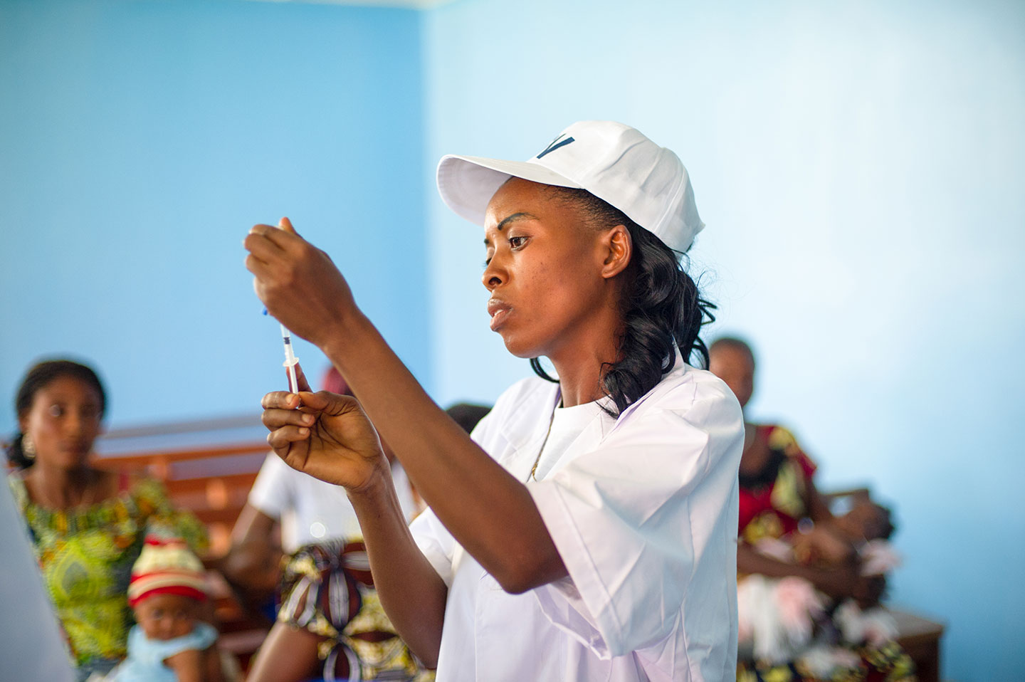 A nurse prepares a dose of inactivated polio vaccine during the launch in the Democratic Republic of the Congo in April 2015. Credit: Gavi/2015/Phil Moore.