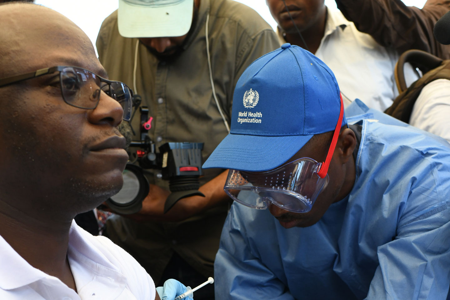 EPI manager Dr Guillaume Ngoie Mwamba receives the first vaccination against Ebola in the DRC in response to the 2018 Equateur province outbreak. Credit: Gavi/2018/Pascal Emmanuel Barollier.