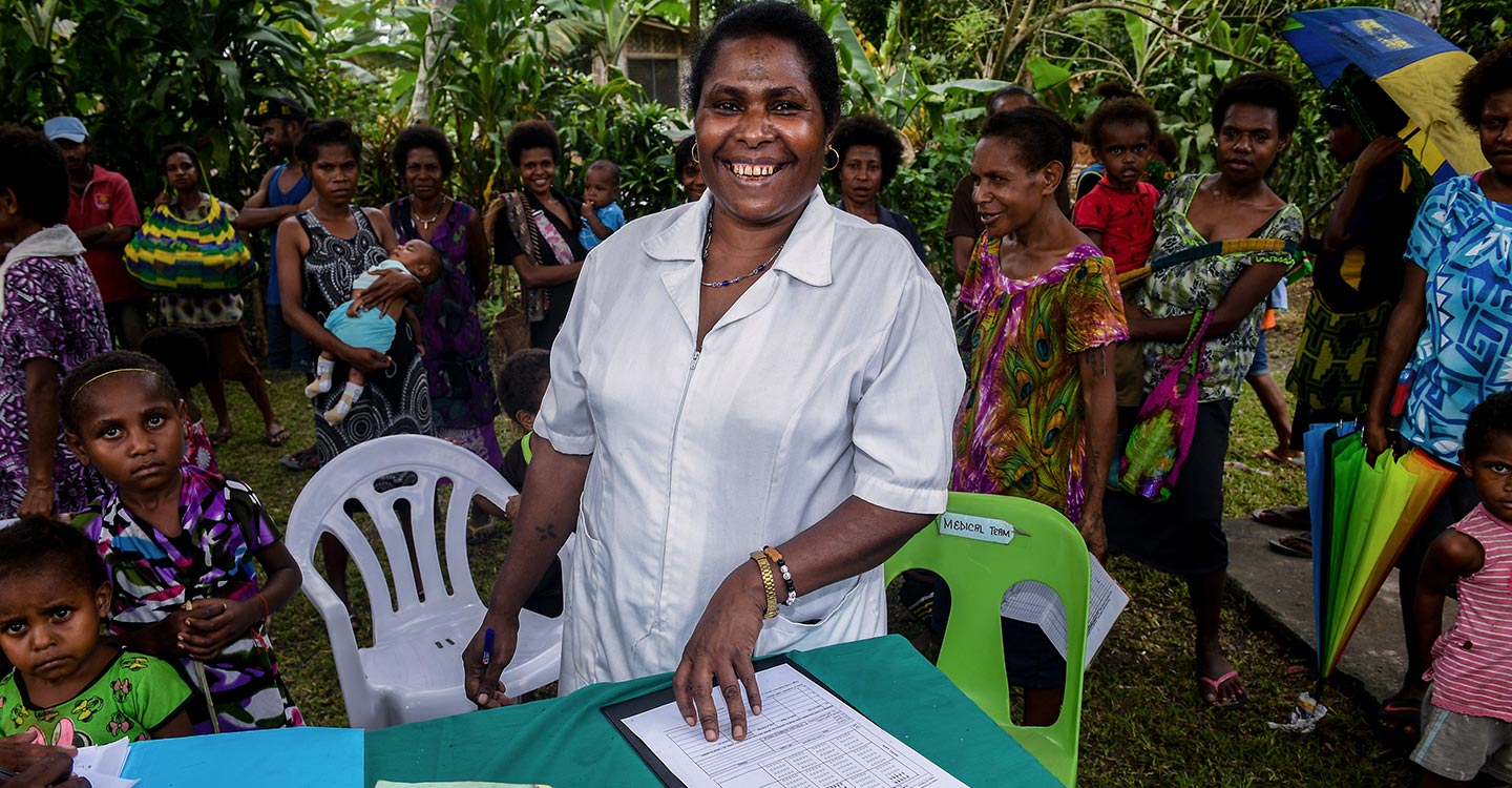 Daisy Basa (centre) officer in charge is seen at the Malahang Health Clinic where the Polio vaccine is administered to children in Lae, Marobe Province, Papua New Guinea, Tuesday, July 24, 2018