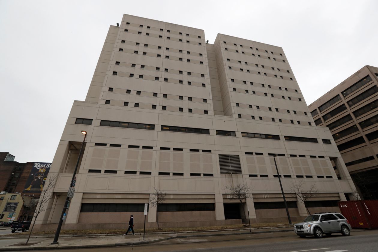 Image from the WSJ article: The Cuyahoga County Corrections Center in Cleveland, where more than 400 inmates have been removed. PHOTO: TONY DEJAK/ASSOCIATED PRESS Image from the WSJ article: The Cuyahoga County Corrections Center in Cleveland, where more than 400 inmates have been removed. PHOTO: TONY DEJAK/ASSOCIATED PRESS