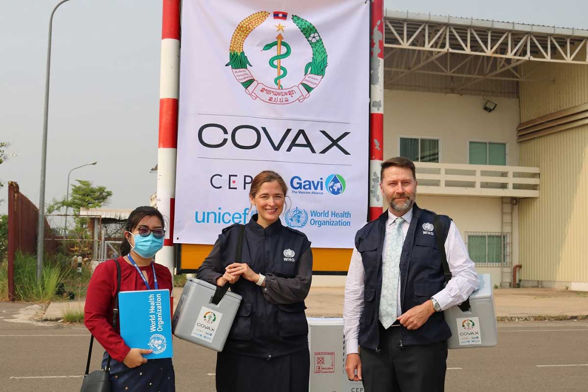 Dr Mark Jacobs, Dr Lauren Elizabeth Franzel-Sassanpour, and Ms Souliya Channavong of the World Health Organization were on site to receive the COVID-19 vaccines together with partners. Credit: @ World Health Organization Western Pacific