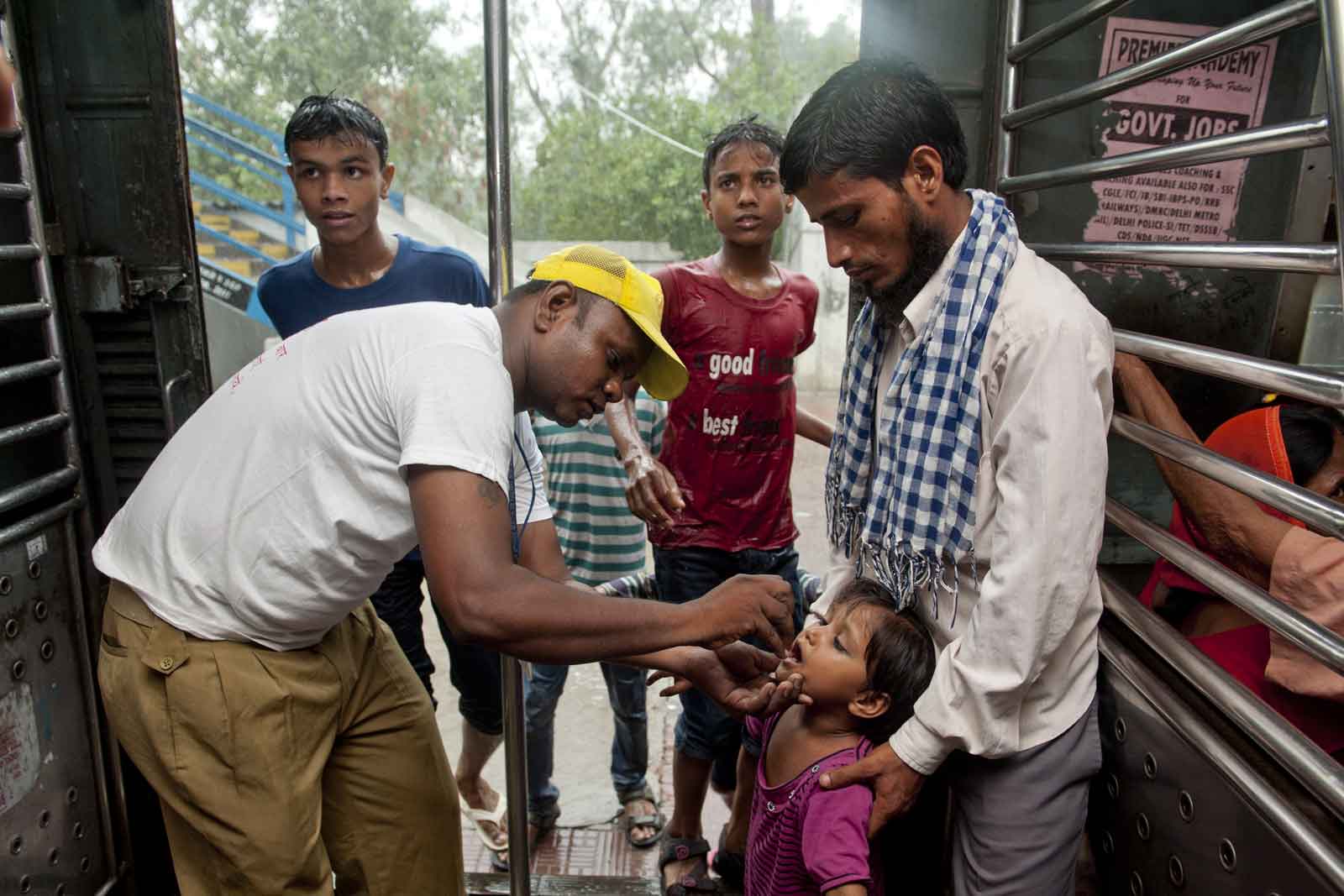 Transforming India's immunisation landscape through innovation Ishtiaq Ahmed watches as his four-year-old daughter Alka is given polio vaccine by vaccinator Vinod Kumar on a moving train in the Delhi suburb of Ghaziabad. In a single 24-hour period as many as 100,000 children across India are vaccinated on trains as part of a polio eradication effort aimed at catching migrant populations.