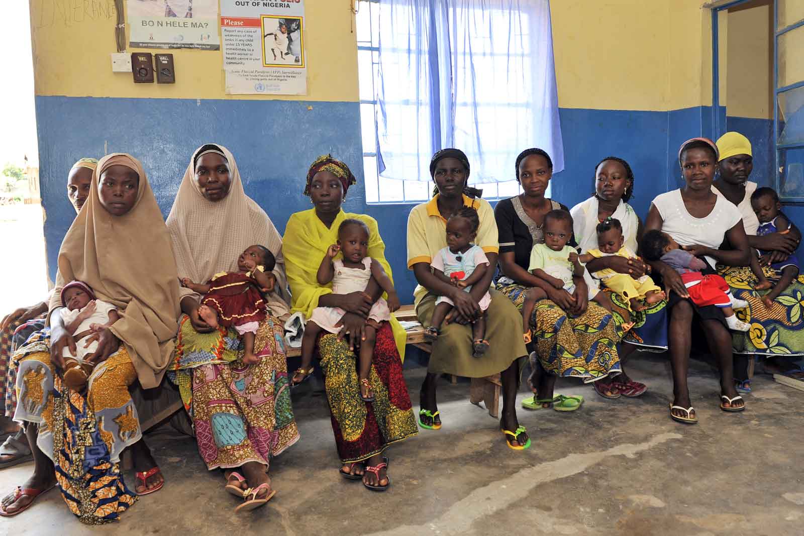 Under Nigeria’s federal system of government, each state organises and delivers health care autonomously. This translates into marked differences in the quality of health care, including immunisation, between states. Here women wait at a maternal health clinic in Niger State.