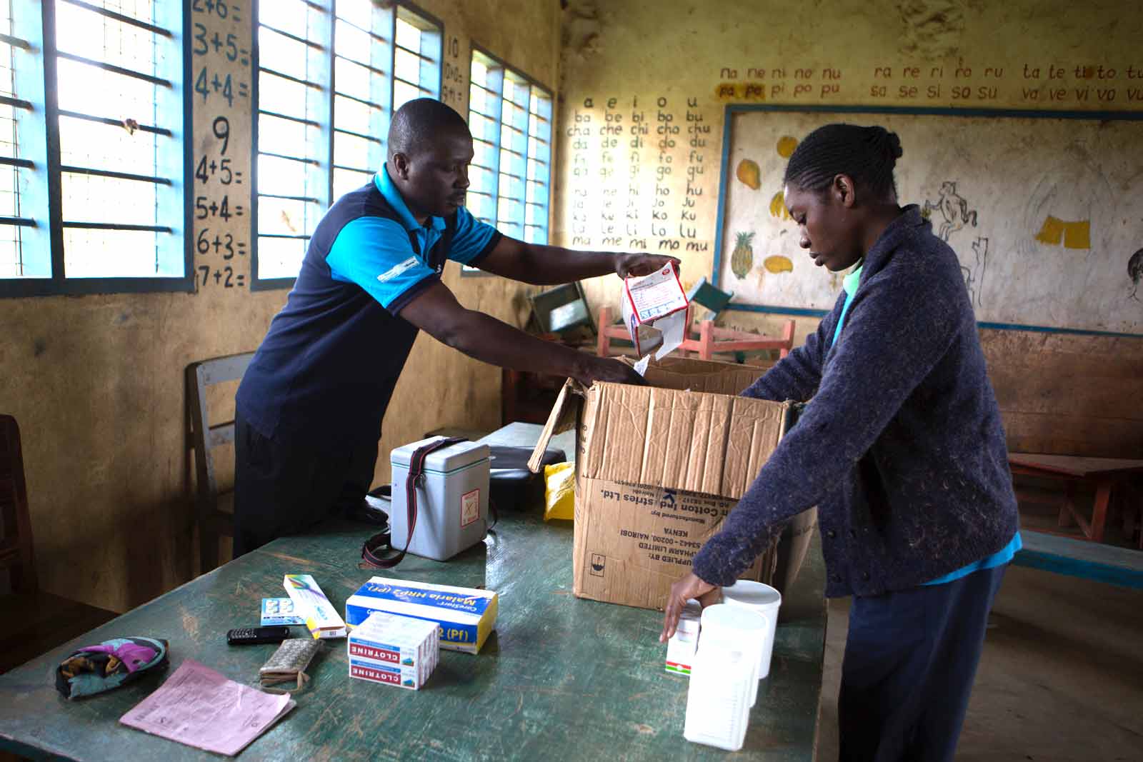  The study maps the growing coverage of the PCV vaccine, while concurrently monitoring the incidence of invasive pneumococcal disease. After a 20 minute ride - a distance that would take a mother on foot carrying her baby more than two hours - Oscar Kai sets up his laptop on a desk in a rural classroom where children will receive vaccinations and their health records will be captured digitally.