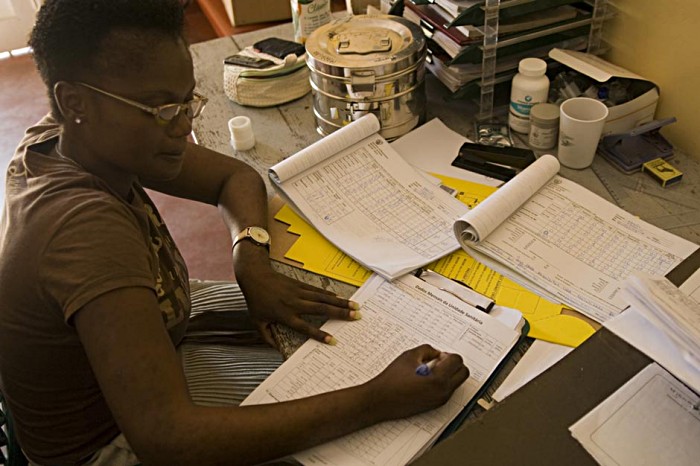 Cecilia Salina Vasco Saudoso Mandlate, a field coordinator at the provincial health ministry, double-checks that the right vaccines, which include measles, polio and pentavalent, have been delivered for the right place.