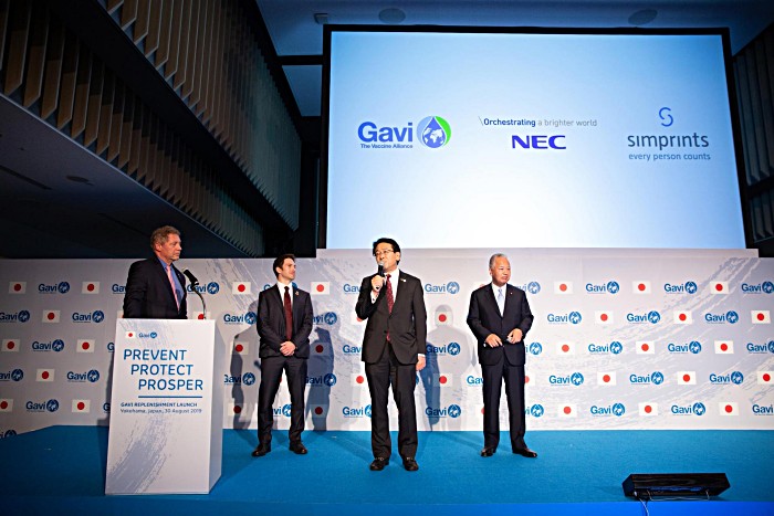 Harnessing Innovation for Immunisation - an interactive presentation of biometrics for immunisation. Left to right: Dr Seth Berkley, CEO, Gavi, the Vaccine Alliance; Toby Norman, CEO, Simprints; Toshiya Matsuki, Executive Vice President, NEC; Hon. Akira Amari, Member of Diet, Japan.