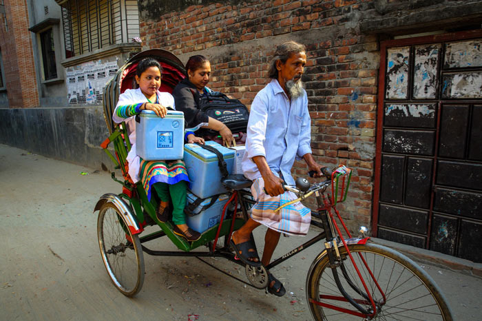 In Dhaka, rickshaws were then used to speed both Muna and her cold boxes, packed with ice and vaccines, through crowded streets to immunisation sessions.