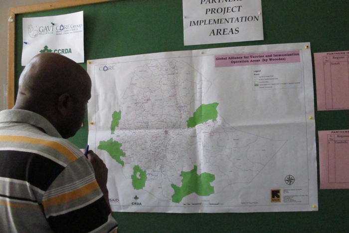 Dr. Gideon Tefera, emergency health & nutrition programme manager for World Vision Ethiopia, examines operational regions for GAVI-supported CSOs working to reach populations living outside the catchment of government services.