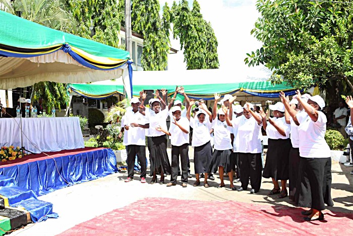 The health workers, who have undergone special training required to protect and administer two vaccines simultaneously, join in the celebrations.