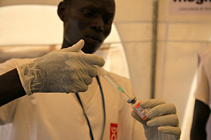 James Tariak is among the staff at the clinic, run by Magna Children At Risk. Here he is preparing to administer a vaccine provided by Gavi. Without the work of partners in the field, thousands of children who can no longer reach their local health centres would miss out on crucial vaccinations and be left at risk of childhood illnesses. 