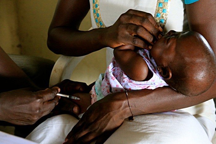 Despite facing enormous challenges, the Government of South Sudan successfully launched the new five-in-one pentavalent vaccine in Juba on July 16. Just two days later, supplies arrived at this clinic in Walag’lang in Central Equatoria province. Here, six-week-old Keji Francis receives a shot that will protect her against diphtheria-tetanus-pertussis (DTP), hepatitis B and Haemophilius influenzae type b. 