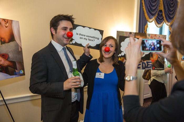 Guests enjoy the Red Nose Day photo booth
