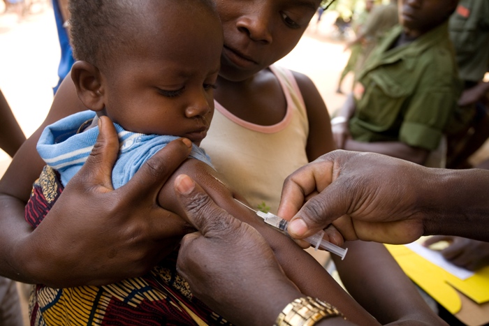A young boy is vaccinated against yellow fever in Togo, one of 1.3 million people targeted in an emergency immunisation campaign.  In 2007, IFFIm funds helped build up a regional stockpile of yellow fever vaccine for west African countries.