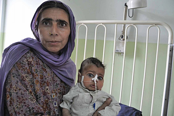 Lal Bah Khan comforts her four-month old son Abuzar Khan, who is on the mend after a bout of pertussis. More and more children are missing out on routine vaccines, because internal conflict makes it difficult to immunise displaced families like Khan’s. “We were trying to get him vaccinated,” says Lal Bah, “I know how important it is.”