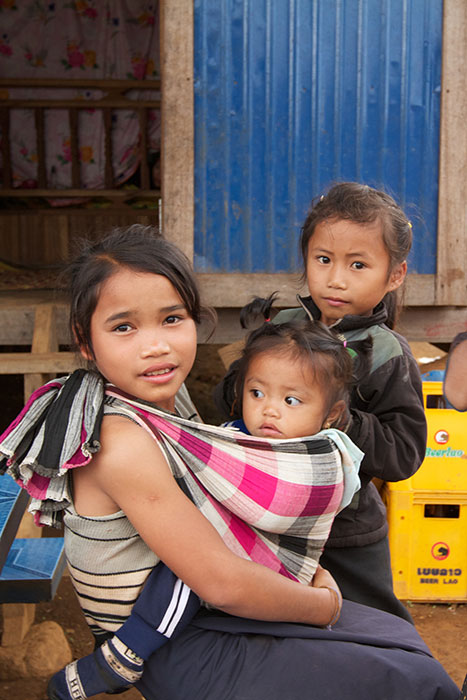 Laotian children pose for the camera in Laos, November 2011. The south-east Asian country conducted an immunisation campaign the same month to protect against measles and immunisation in November 2011.