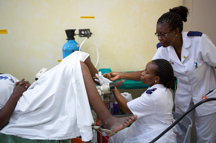 Nurse Rehema Nkomola examines a woman for cervical cancer. Global deaths from cervical cancer have increased 40% since 1990, to 266,000.