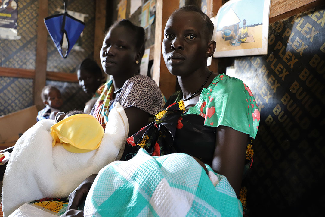 Mothers bring their children for routine vaccination. Credit: © IOM 2020 / Liatile Putsoa