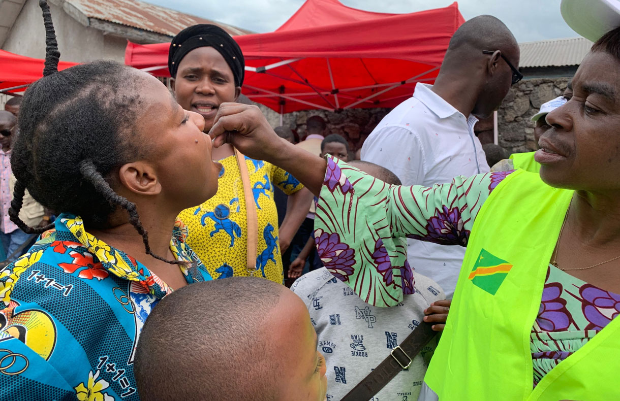 Woman receiving the oral cholera vaccine in the DRC