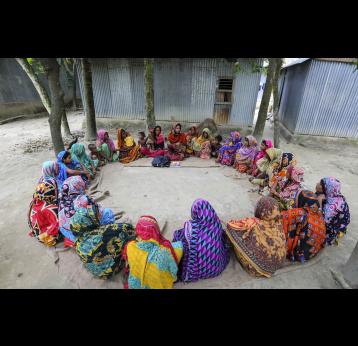 Health worker and pregnant women sitting in a circle in Bangladesh. Credit: Gavi/2014/GMB Akash.