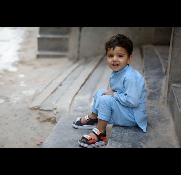 "My son recently got vaccinated against measles and polio. I am happy that he is safe now.” Alamgir, father to two-year-old Fazain. Credit: Gavi/2023/Asad Zaidi