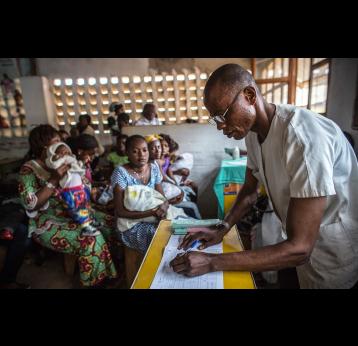 Health workers registering data. Credit: Gavi/2013/Evelyn Hockstein.