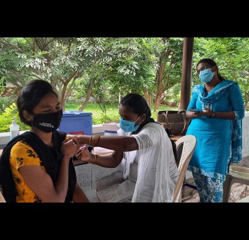 Getting the COVID vaccine. Credit: Babu Seenappa