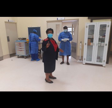 Matron Nurse Sibongile Simelane inspecting the emergency ward and staff prior to the arrival of a COVID-19 patient. Credit: Nonduduzo Kunene