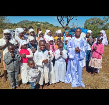 Bishop Andby Makururu with some young members of his Johane The Fifth of Africa International Church - Photo courtesy Andby Makururu