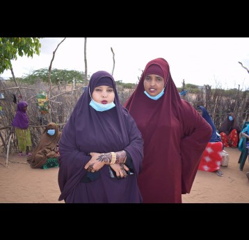 Khadija Maalim and Amina Abdi prepare for a TikTok video shoot in Athelay, Kenya.