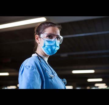 Young female doctor in lab or hospital clinic.