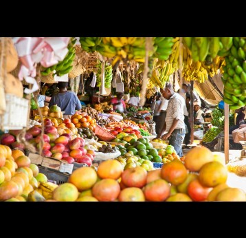Fruit and vegetables at a market in Kenya. The WHO is pushing for consumption of fresh fruits and vegetables, whole grains, beans, fish and unsaturated fats. Shutterstock