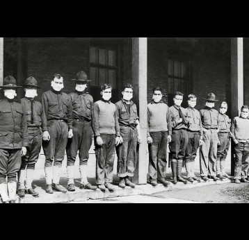 Men wearing masks outside a military hospital in New York during the 1918 influenza pandemic.