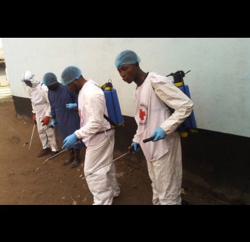 Health workers disinfect a cholera treatment centre in South West Cameroon. Credit: Filbert Eko Eko