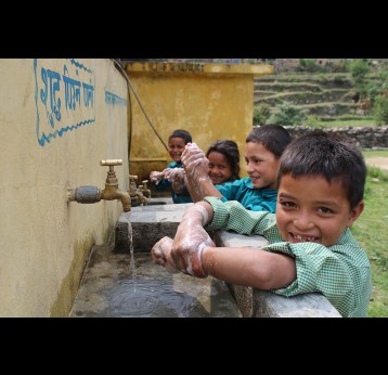 Children washing their hands. Credit: Chhatra Karki