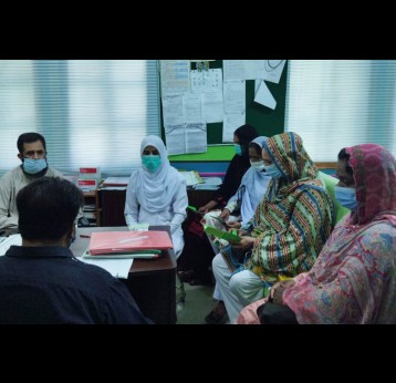 Doctor, staff and patients at THQ Gujjar Khan's TB Unit