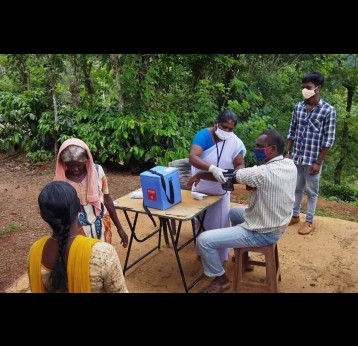 Health workers administering vaccines