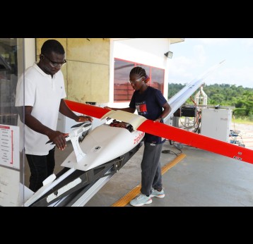 Mid-May at Zipline's Sefwi Wiawso hub: a drone is loaded with its lifesaving payload, ready for a flight to one of more than 400  Western North clinics. Credit: Nipah Dennis