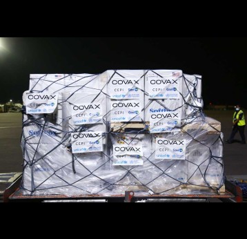 On 15 January 2021, COVID-19 vaccines procured by the COVAX Facility arrive at the airport in Kigali in Rwanda, including the billionth dose supplied via COVAX.  Credit: © UNICEF/UN0579049/Kanobana