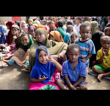 Children wait to be vaccinated during house-to-house visits for a national polio vaccination campaign in Mogadishu, Somalia, on Tuesday 06 June 2022. Credit: ©WHO/ Ismail Taxta