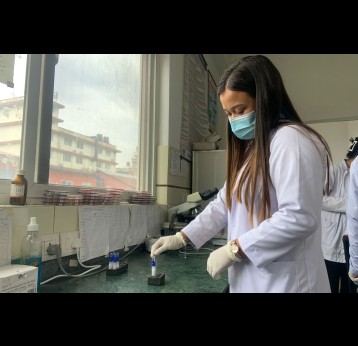 A stool sample being tested using the RDT kit in the laboratory of the infectious disease hospital, Kathmandu. Credit: Pragya Timsina