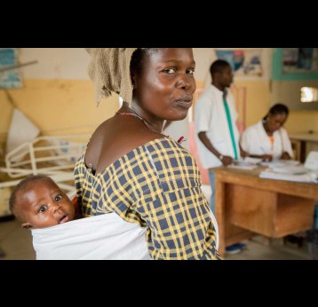 A mother and her newborn waiting to get his pentavalent, polio and pneumococcal shots in Northern Senegal. Credit: Gavi/2018/Simon Davis